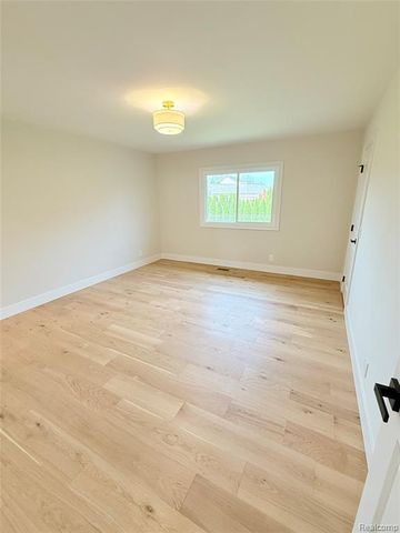 51073 Pinewood Drive, Macomb, MI 48042