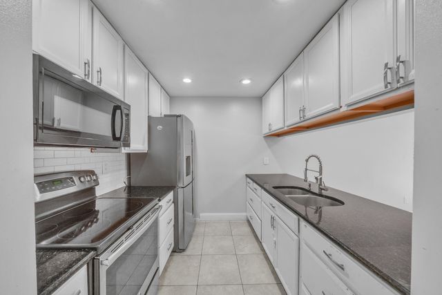1030 Parkside Green Drive A, Greenacres, FL 33415