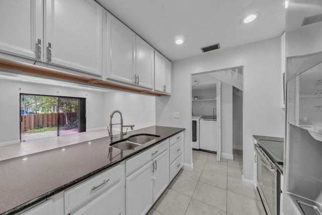 1030 Parkside Green Drive A, Greenacres, FL 33415