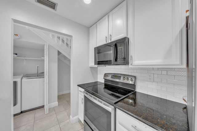 1030 Parkside Green Drive A, Greenacres, FL 33415