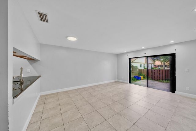 1030 Parkside Green Drive A, Greenacres, FL 33415