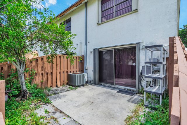 1030 Parkside Green Drive A, Greenacres, FL 33415