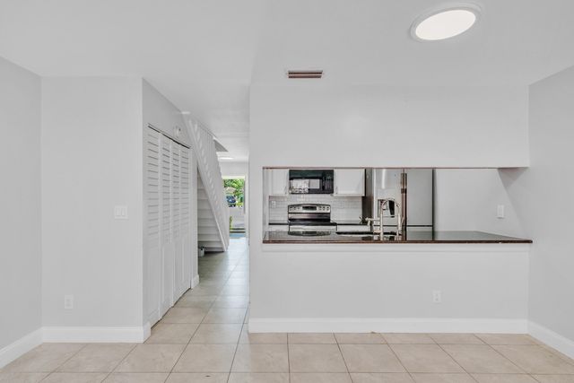 1030 Parkside Green Drive A, Greenacres, FL 33415