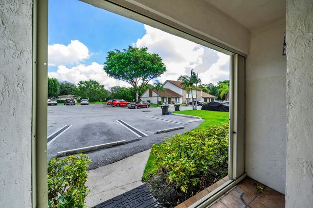1030 Parkside Green Drive A, Greenacres, FL 33415
