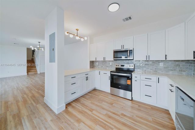 1551 Seagrape Way, Hollywood, FL 33019