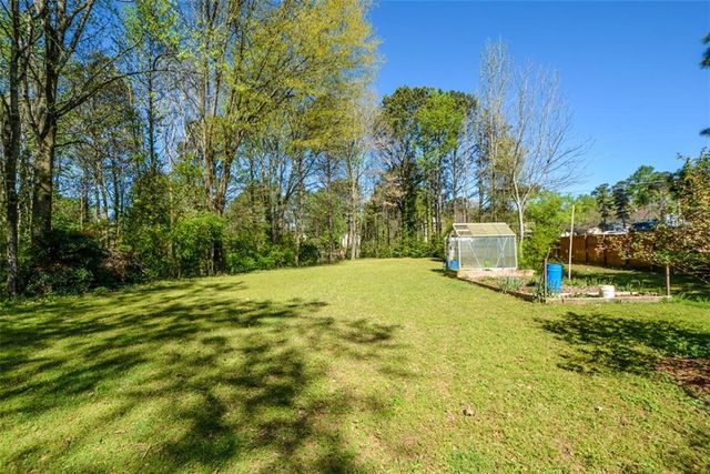 3060 Camelot Woods Drive, Lawrenceville, GA 30044