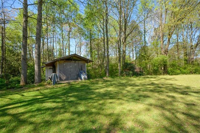 3060 Camelot Woods Drive, Lawrenceville, GA 30044