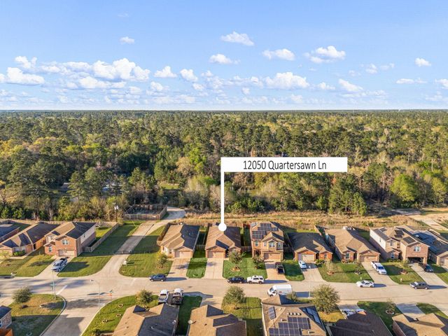 12050 Quartersawn Lane, Pinehurst, TX 77362