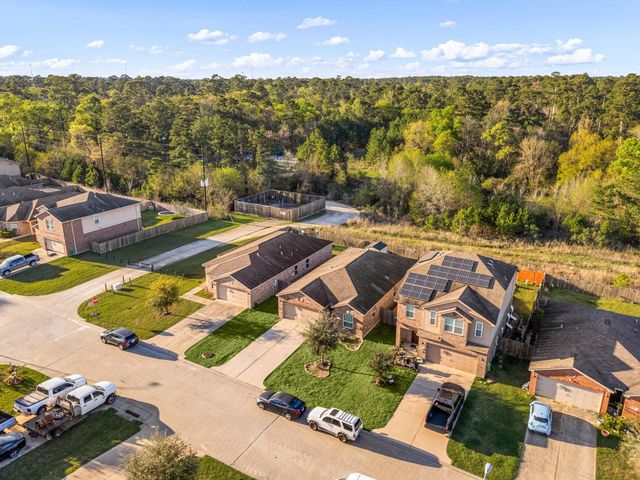 12050 Quartersawn Lane, Pinehurst, TX 77362