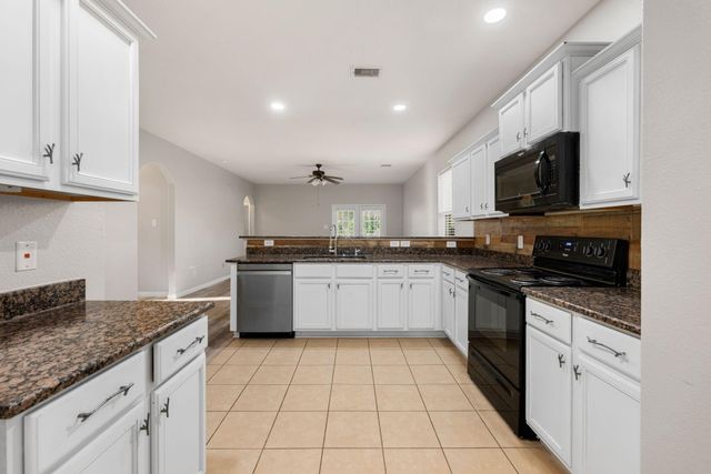 12050 Quartersawn Lane, Pinehurst, TX 77362