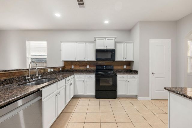 12050 Quartersawn Lane, Pinehurst, TX 77362