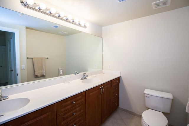 6492 EMERALD DUNES Drive 205, West Palm Beach, FL 33411