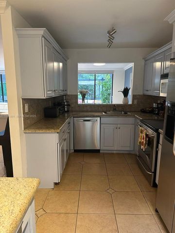 9805 Costa Del Sol Blvd C-102, Doral, FL 33178