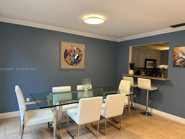 9805 Costa Del Sol Blvd C-102, Doral, FL 33178