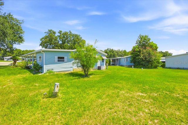 2679 LAKE GRASSMERE CIRCLE 903, Zellwood, FL 32798