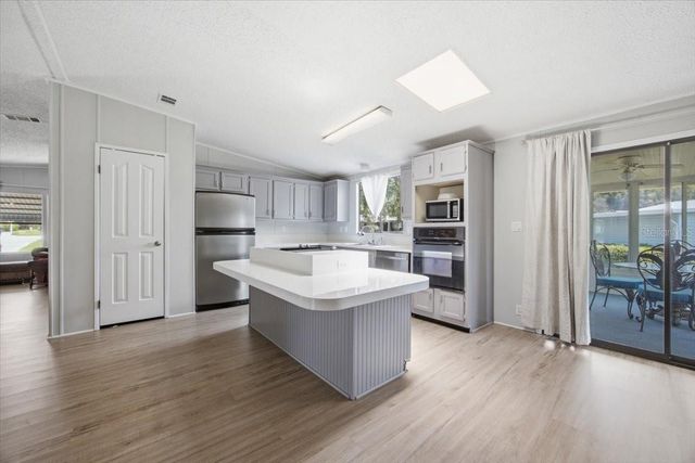 2679 LAKE GRASSMERE CIRCLE 903, Zellwood, FL 32798
