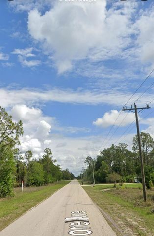 109 Moore Avenue, Lehigh Acres, FL 33936