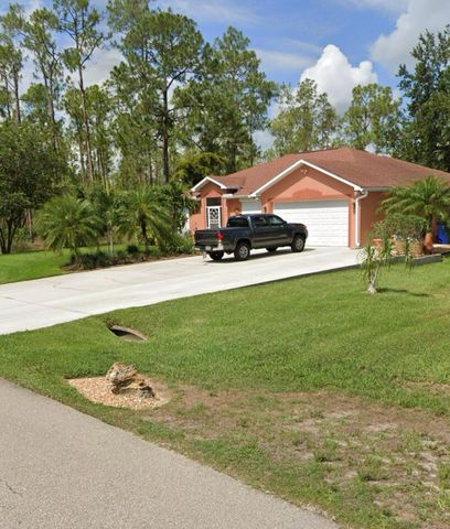 109 Moore Avenue, Lehigh Acres, FL 33936