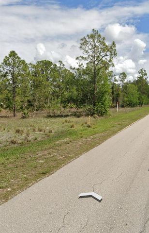 109 Moore Avenue, Lehigh Acres, FL 33936