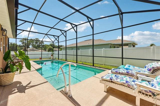 8077 CHERRYSTONE STREET, Leesburg, FL 34748