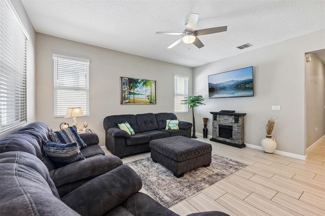8077 CHERRYSTONE STREET, Leesburg, FL 34748