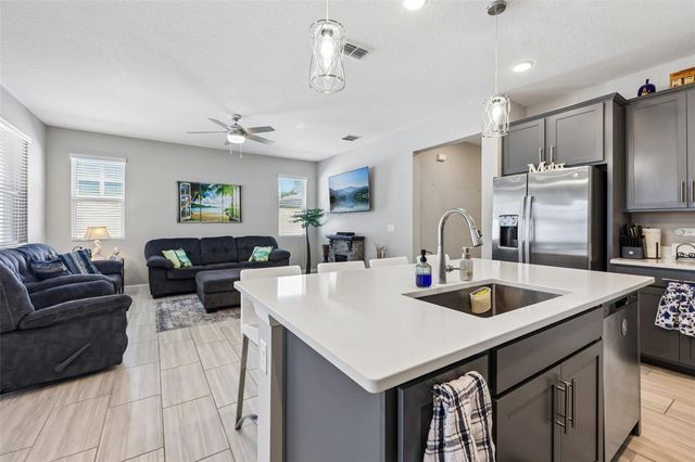 8077 CHERRYSTONE STREET, Leesburg, FL 34748