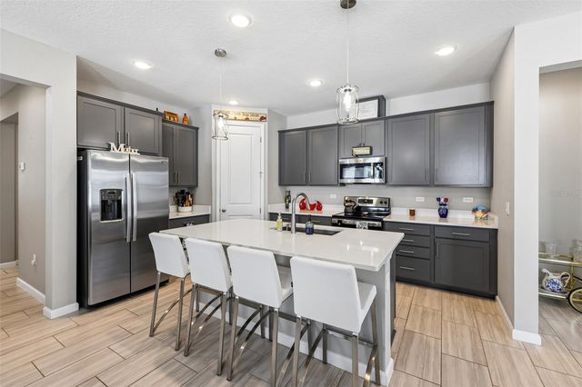 8077 CHERRYSTONE STREET, Leesburg, FL 34748