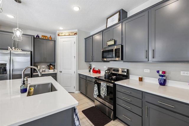 8077 CHERRYSTONE STREET, Leesburg, FL 34748