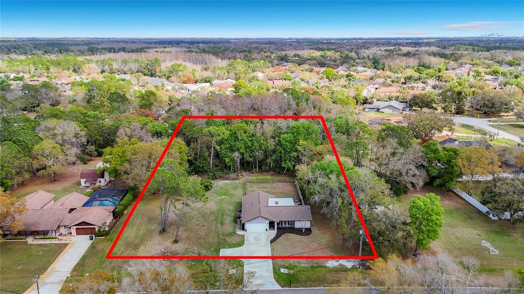 Image 2 of property listing at 12504 TWIN BRANCH ACRES ROAD, Tampa, FL 33626