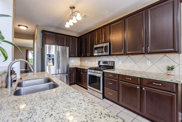 9626 Red Rugosa Drive, Houston, TX 77095