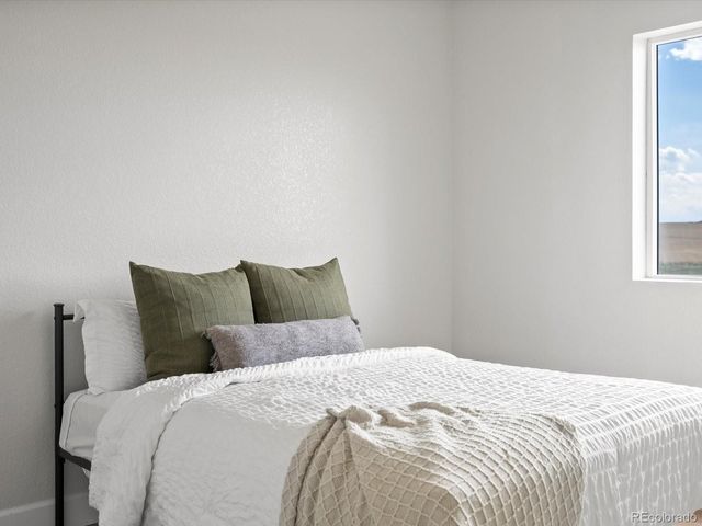 61800 E 32nd Court, Strasburg, CO 80136