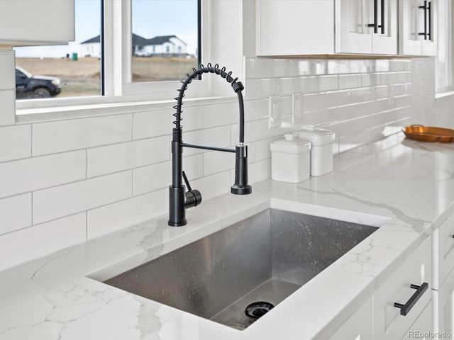 61800 E 32nd Court, Strasburg, CO 80136