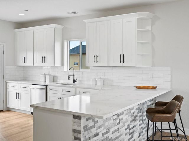 61800 E 32nd Court, Strasburg, CO 80136