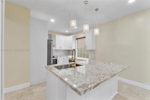 5310 NW 124th Way, Coral Springs, FL 33076