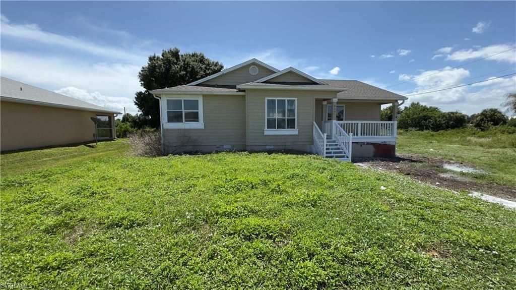 824 Frederick Reid ST E, LEHIGH ACRES, FL 33974 — photo 2