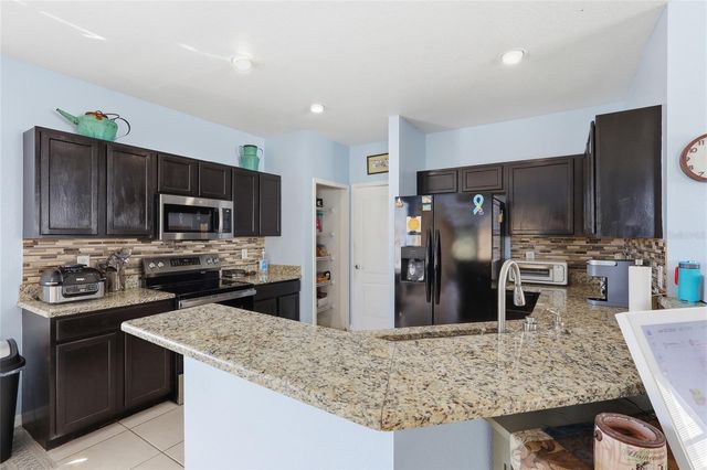 7902 CARRIAGE POINTE DR, Gibsonton, FL 33534