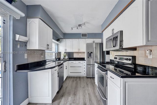 3753 NW 73rd Way, Coral Springs, FL 33065