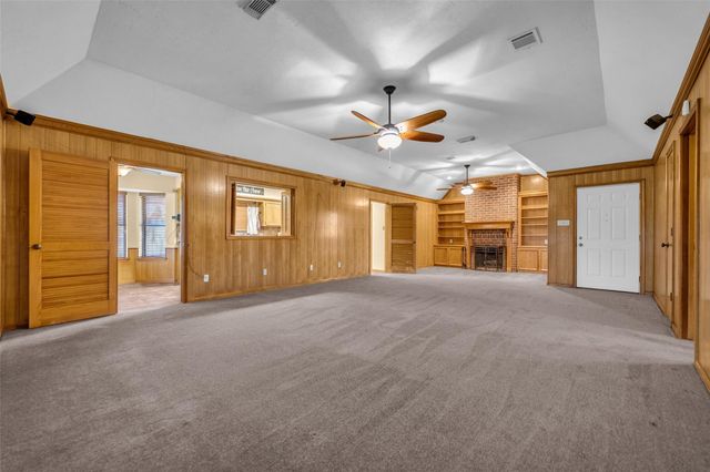 7093 Whispering Wind Drive, Willis, TX 77318