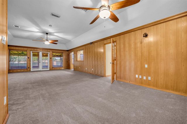 7093 Whispering Wind Drive, Willis, TX 77318