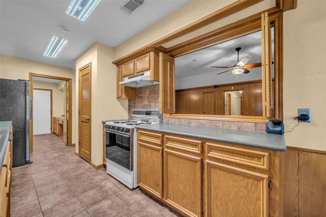 7093 Whispering Wind Drive, Willis, TX 77318