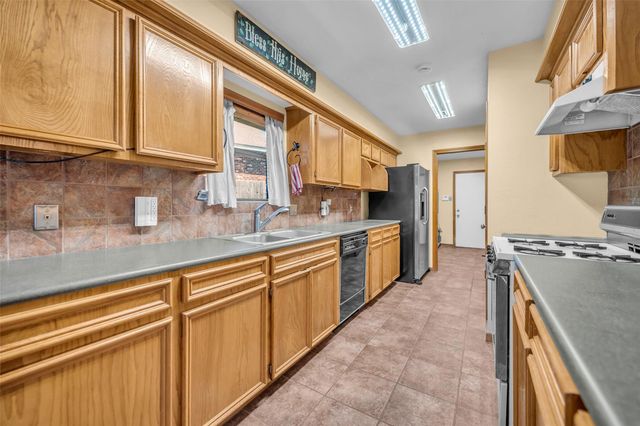7093 Whispering Wind Drive, Willis, TX 77318