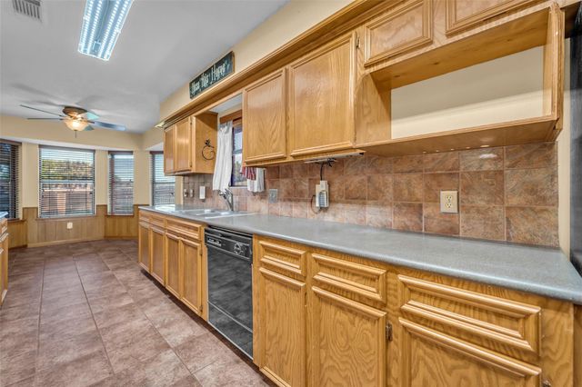 7093 Whispering Wind Drive, Willis, TX 77318