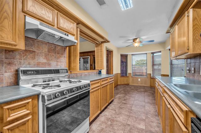 7093 Whispering Wind Drive, Willis, TX 77318