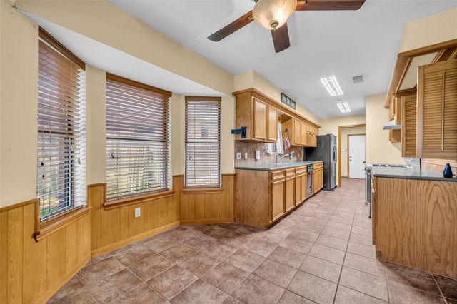 7093 Whispering Wind Drive, Willis, TX 77318