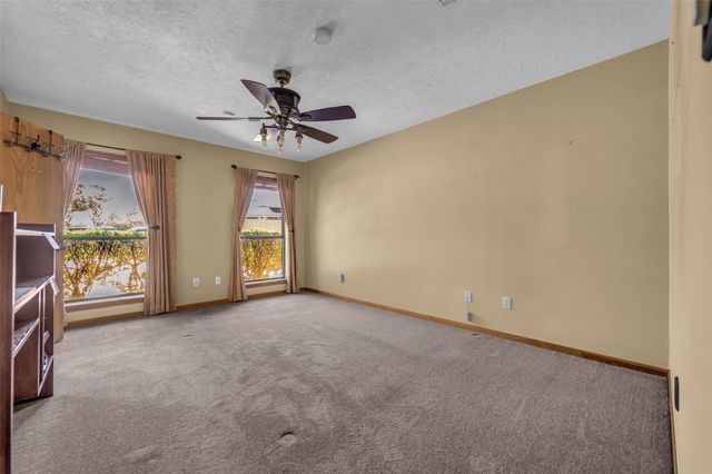7093 Whispering Wind Drive, Willis, TX 77318