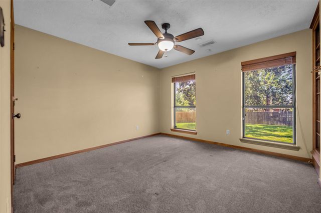 7093 Whispering Wind Drive, Willis, TX 77318
