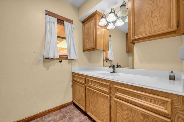 7093 Whispering Wind Drive, Willis, TX 77318