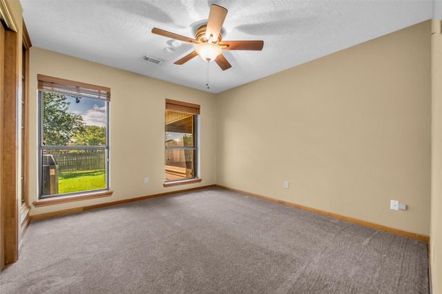 7093 Whispering Wind Drive, Willis, TX 77318