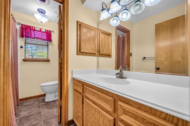 7093 Whispering Wind Drive, Willis, TX 77318