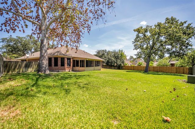 7093 Whispering Wind Drive, Willis, TX 77318